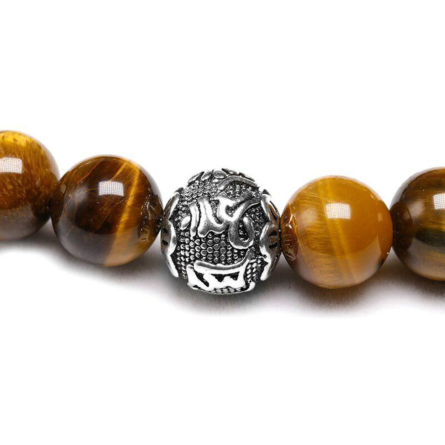 Bracelet en Œil de tigre naturel et 3 perles cylindriques gravées « Om Mani Padme Hum »