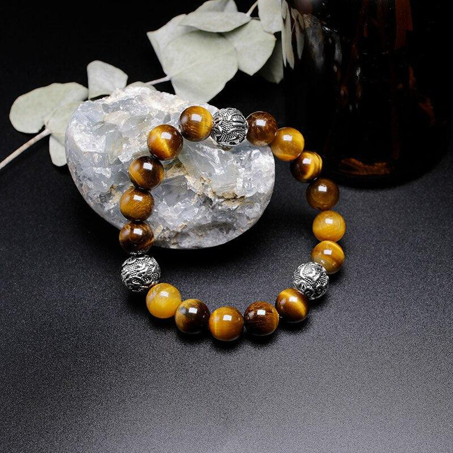 Bracelet en Œil de tigre naturel et 3 perles cylindriques gravées « Om Mani Padme Hum »