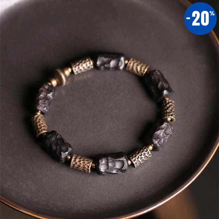 Bracelet en bois d’ébène et cuivre martelé