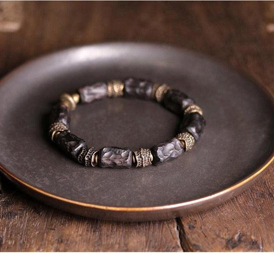 Bracelet en bois d’ébène et cuivre martelé