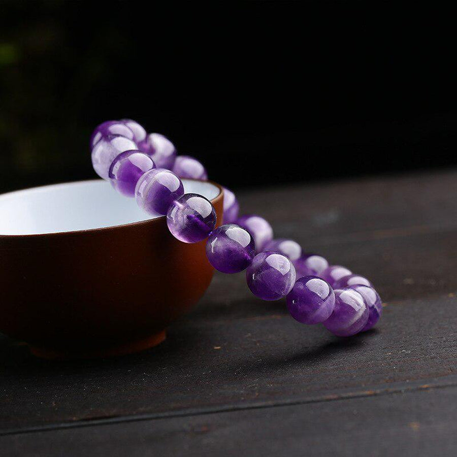 Bracelets en perles de cristal violets