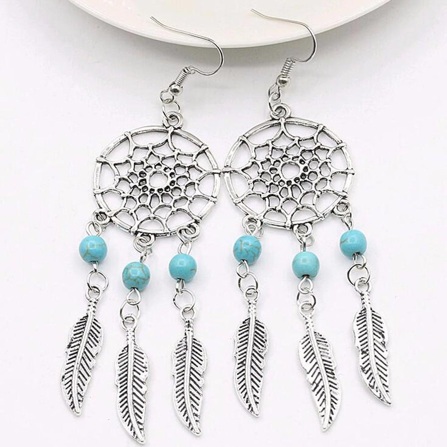 Boucles d'oreilles Boheme à plume attrape rêve