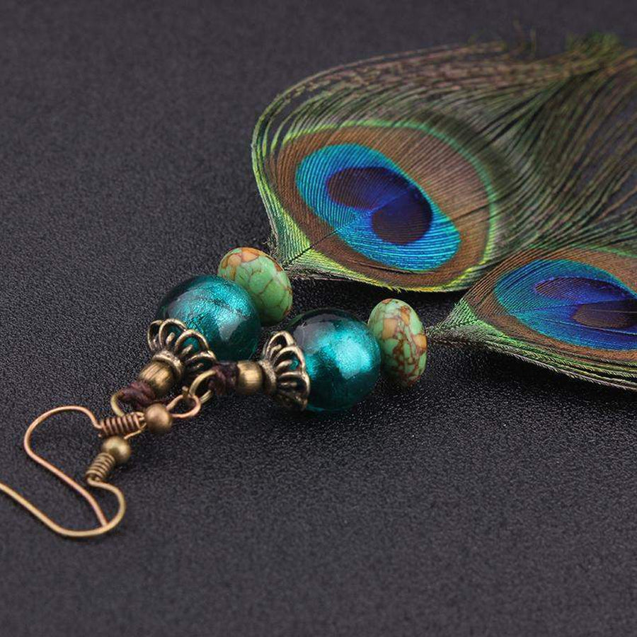 Boucles d'oreilles plumes de paon