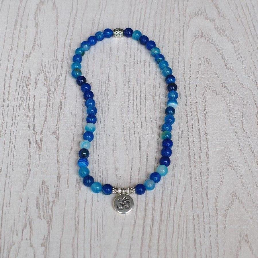 Bracelet avec charme en Onyx bleu