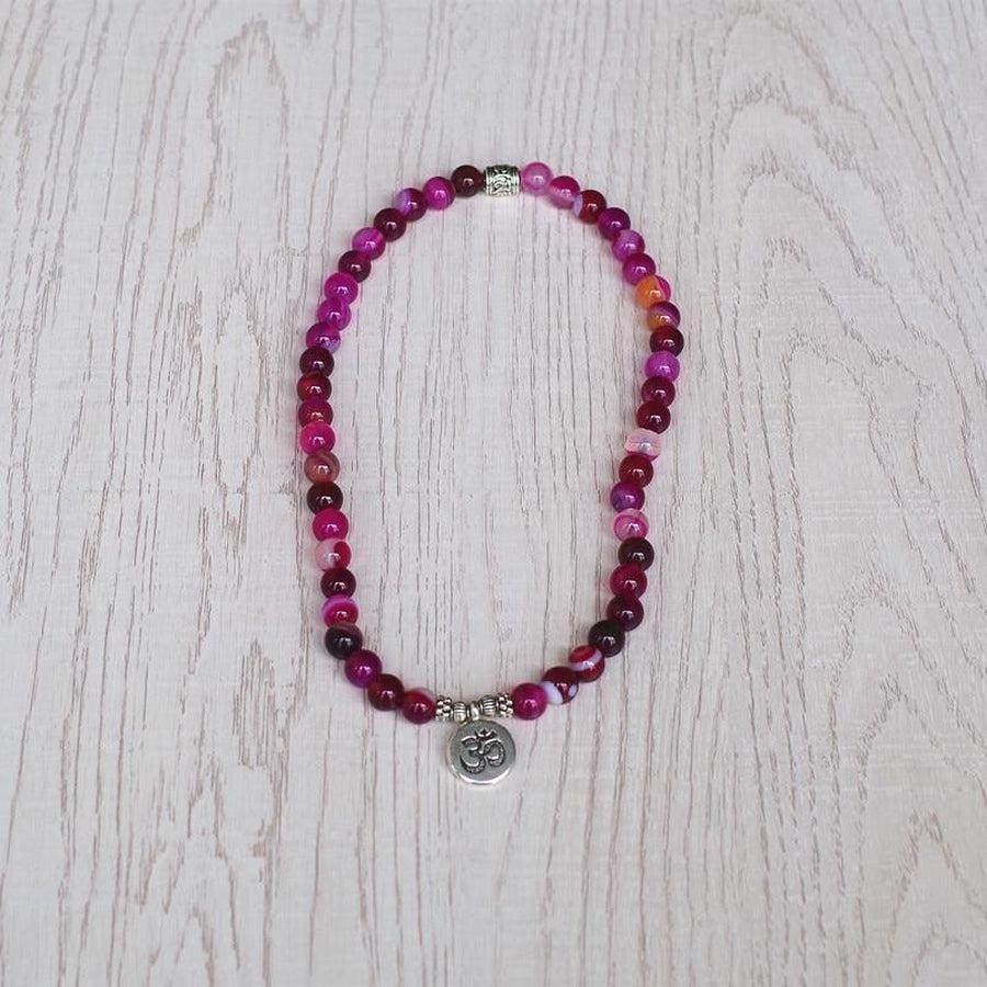 Bracelet avec charme en Onyx rose