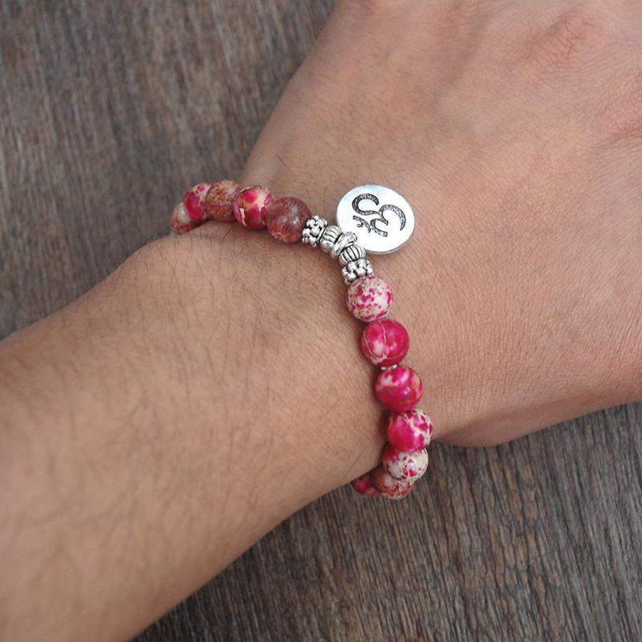 Bracelet «Charm» en agate rose