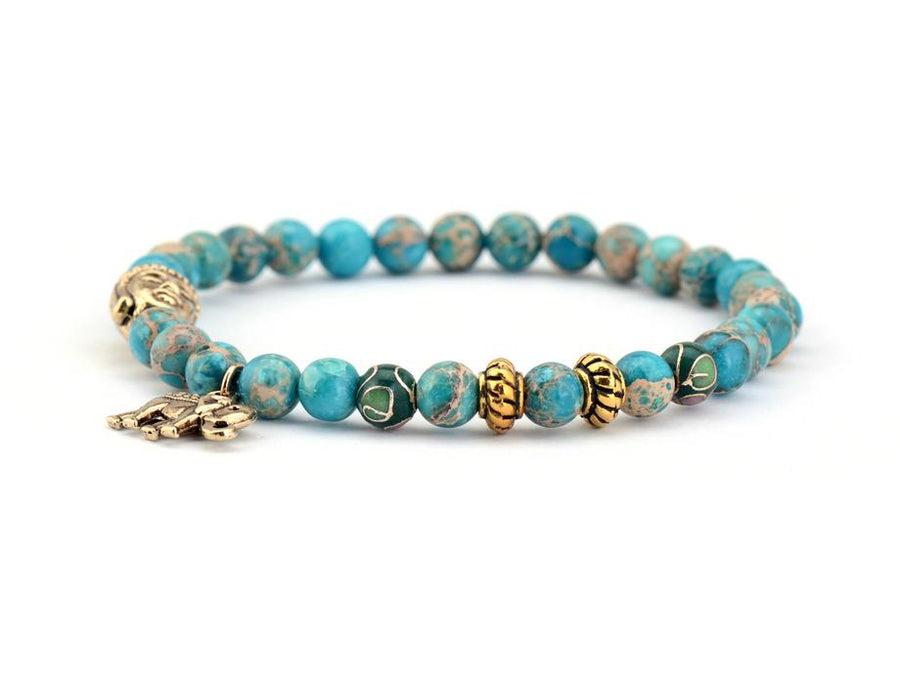Bracelet en perles de Turquoise et symboles sacrés