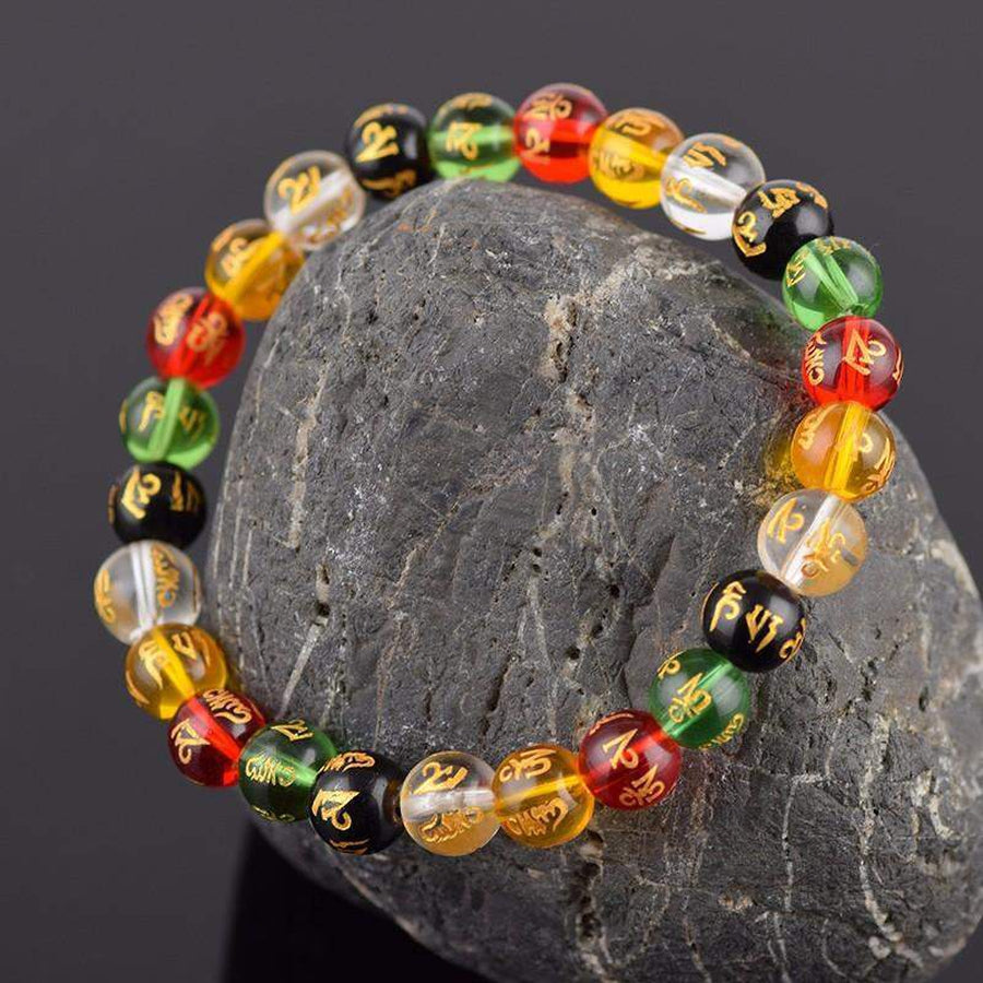 Bracelet energie en perle de verre Om Mani Padme Hum