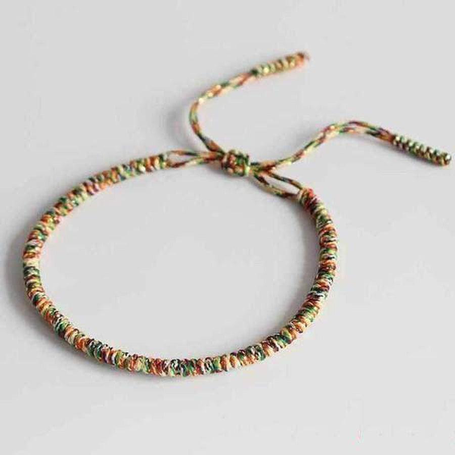 Bracelet porte-bonheur tressé à la main (comme celui de Leonardo DiCaprio)