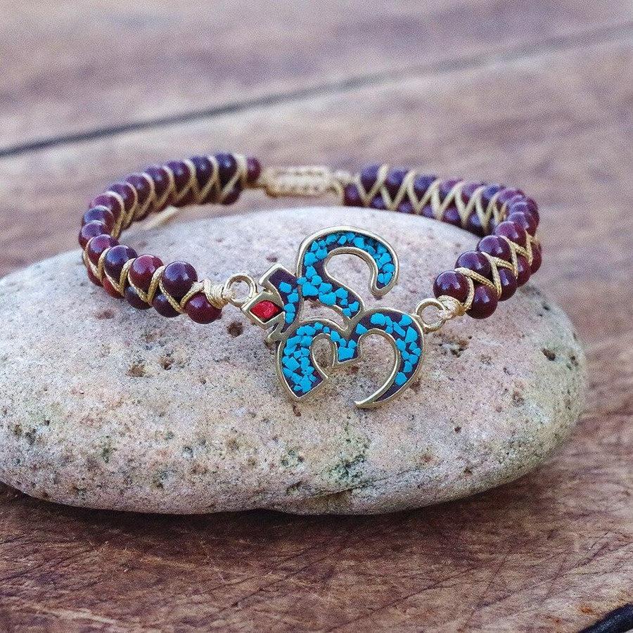 Bracelet Shamballa en Améthyste naturelle et symbole « Om »