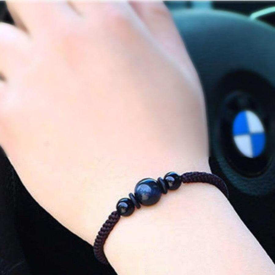 Bracelet Shamballa Œil de tigre bleu sur cordon tissé