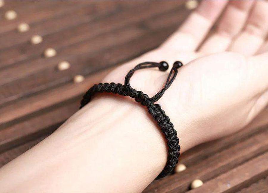 Bracelet tressé serti par une obsidienne oeil celeste