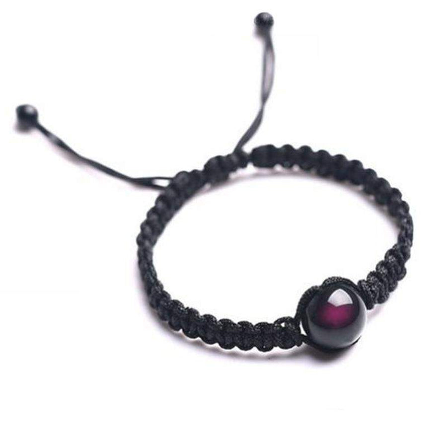 Bracelet tressé serti par une obsidienne oeil celeste