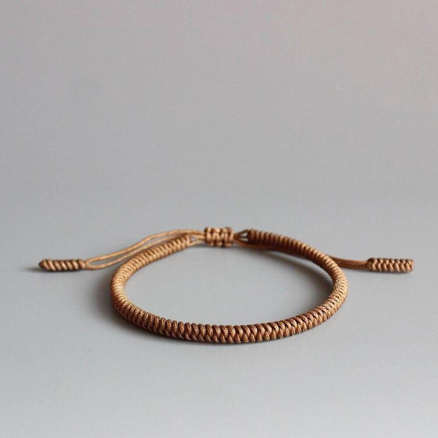 Bracelets bouddhistes unis tressés à la main