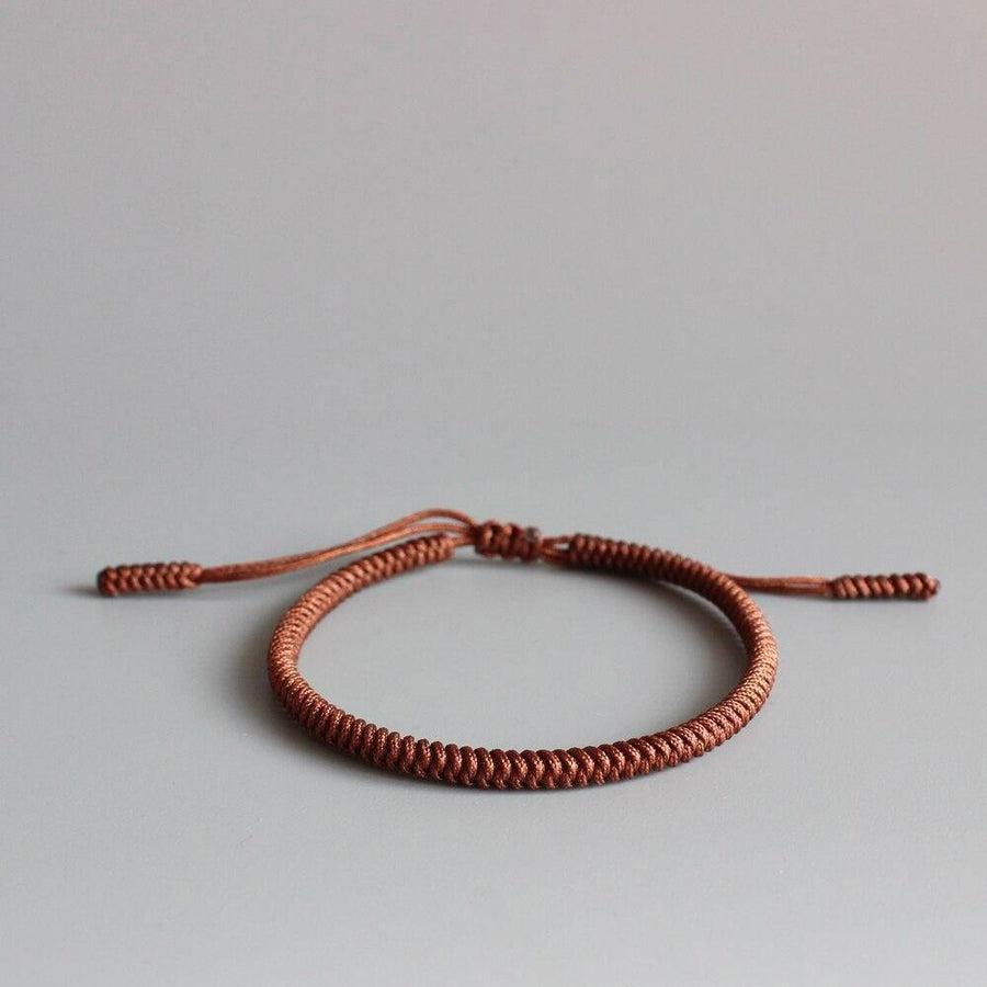 Bracelets bouddhistes unis tressés à la main