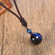 Collier avec pendentif en Oeil de Faucon (Oeil de Tigre bleu)