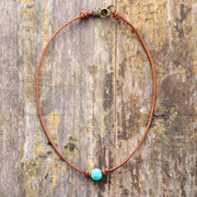 Collier «Spiritualité» perle de Turquoise sur cordon en cuir ciré