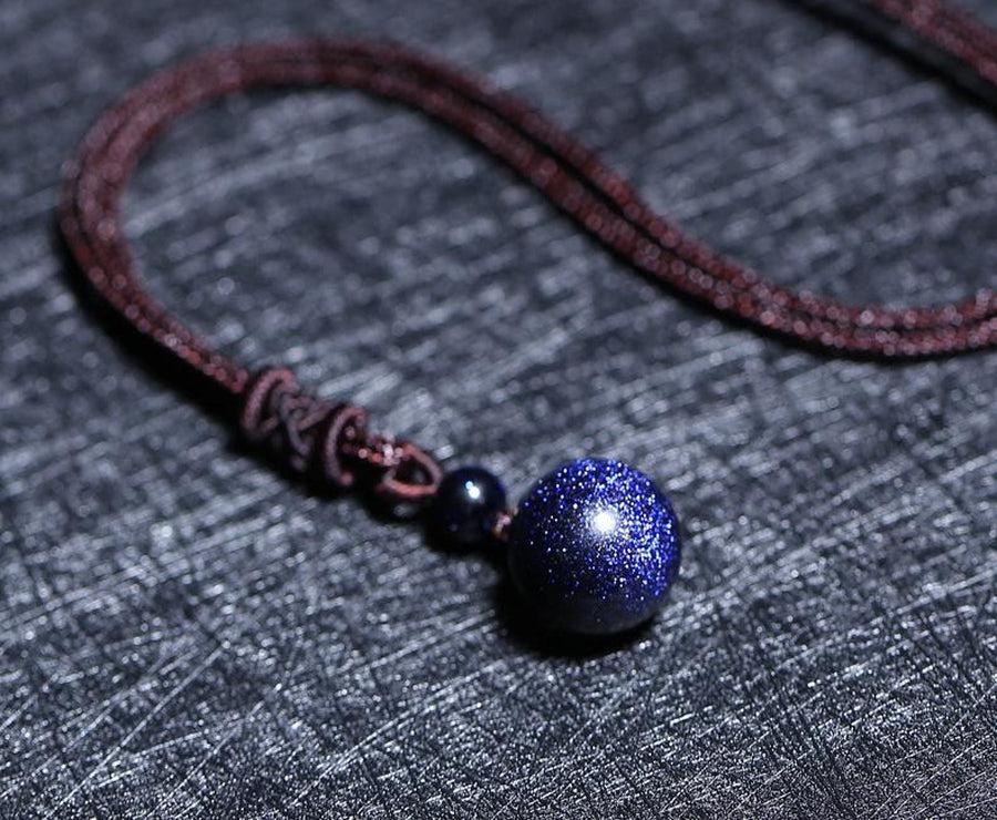 Pendentif boules en gré bleu
