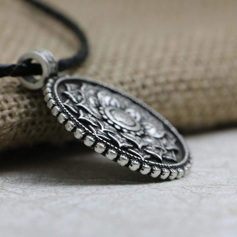 Pendentif fleur sacré tibetain