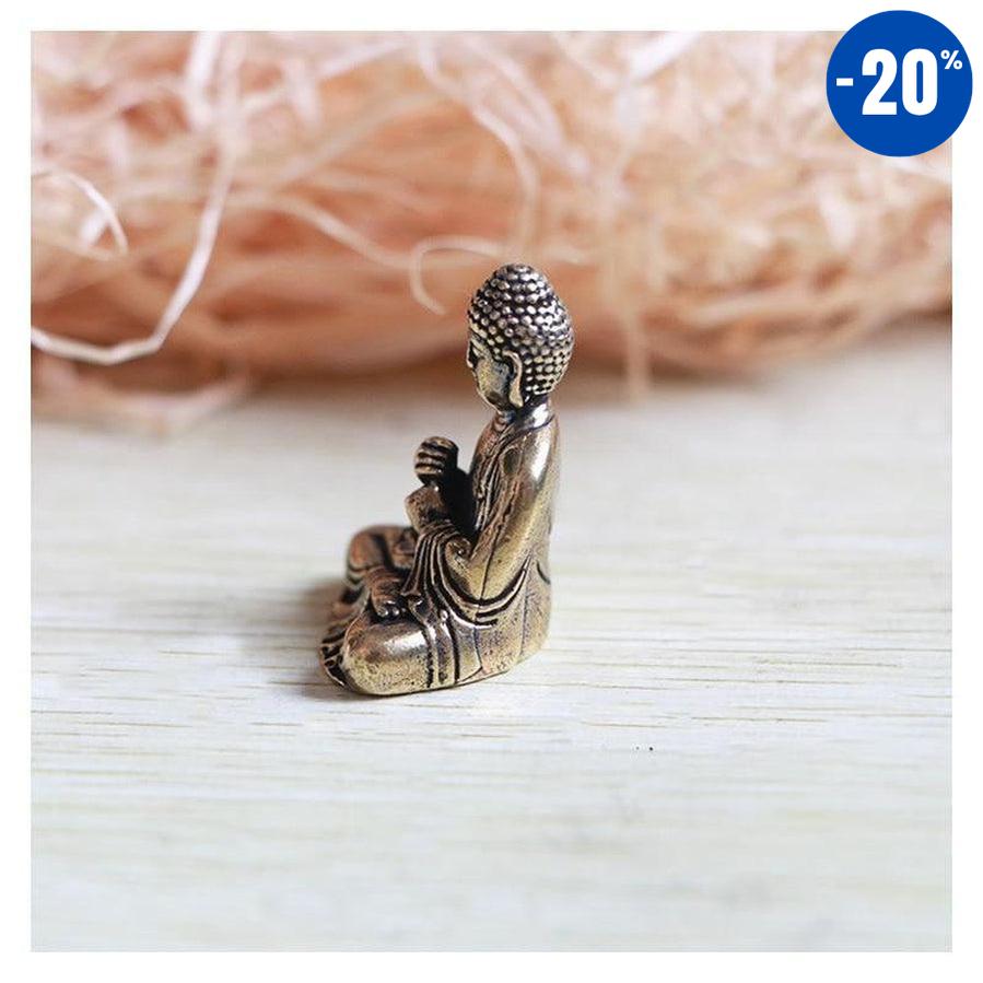 Statuette sculptée de Bouddha en laiton